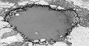 https://rebelreach.blob.core.windows.net/6533/images/pothole-jpg.png